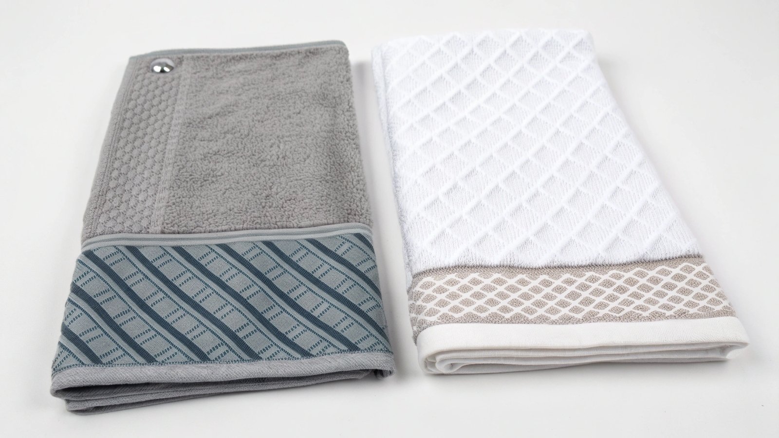 Close-up of a golf towel's texture and grommet vs. a regular hand towel