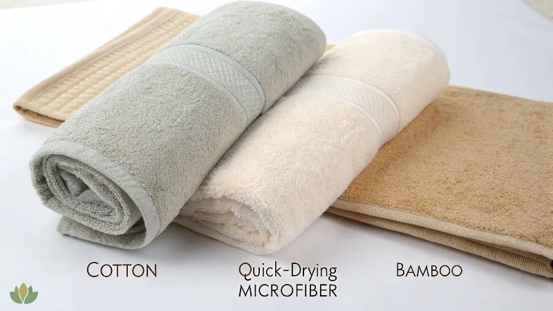A stack of different colored and textured bath towels